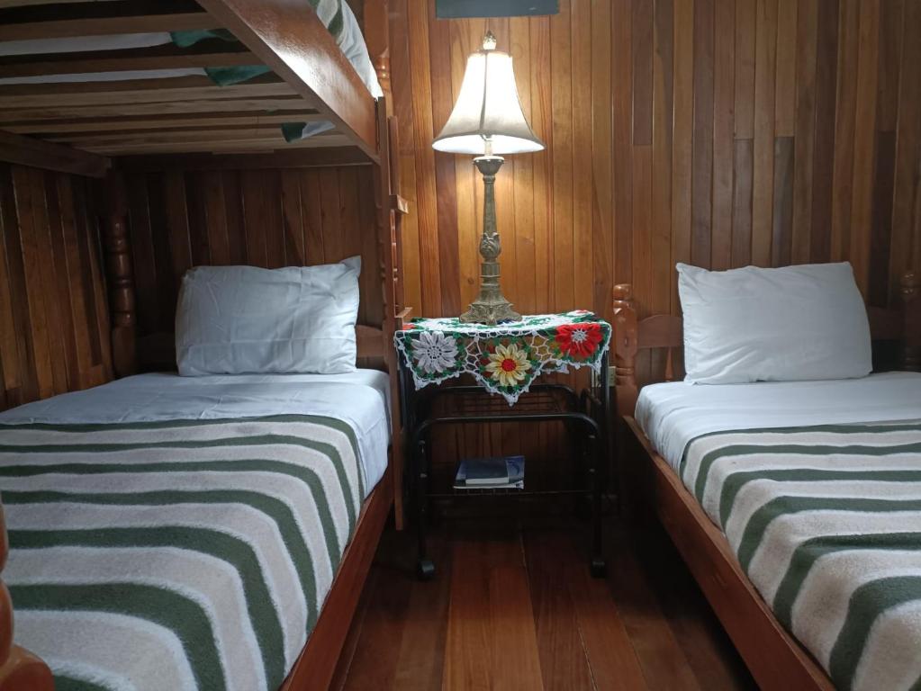 Habitacion Triple — tres camas individuales